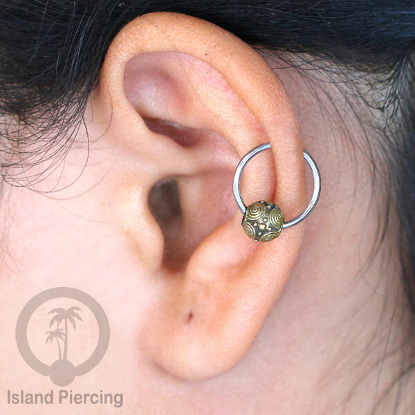 Tindik Stainless Piercing BCR dengan bola Kuningan banyak pilihan yang unik