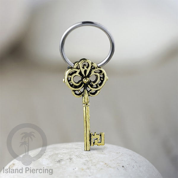 Tindik Stainless Piercing BCR dengan Liontin Kuningan Buddha, Ganesh, Kunci dan Jamur