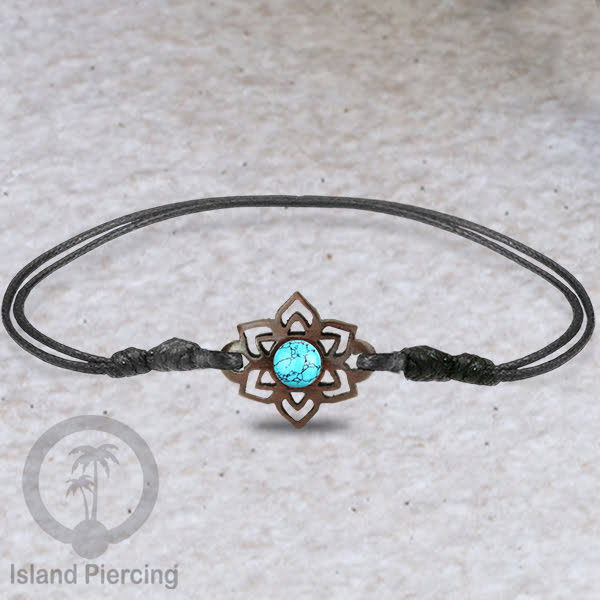 Gelang Tangan Tali yang pakai Liotin kayu Sono dengan isi batu atau kerang asli