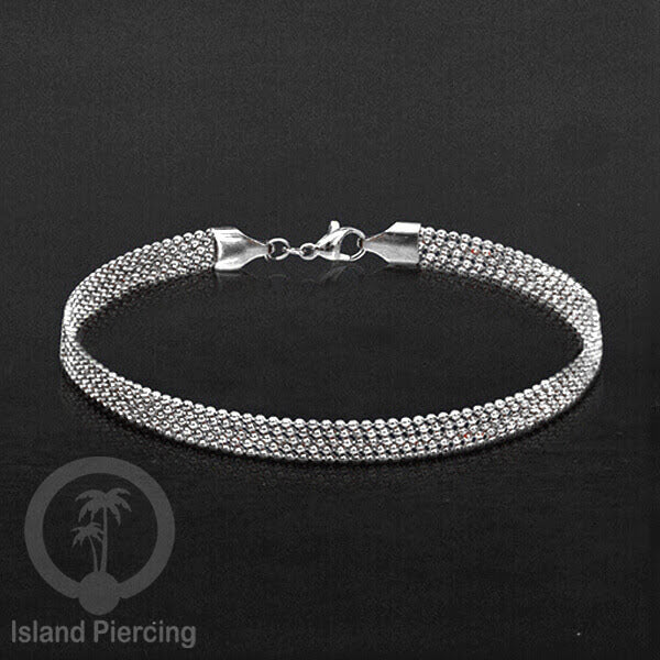 Gelang Tangan dari baja stainless warna silver. Model lebar 3-5 rantai.