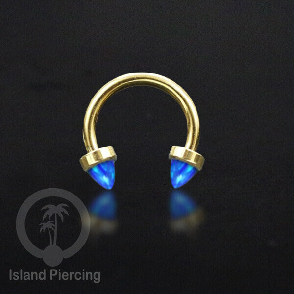 Circular Barbell Piercing dan Septum Jewelry warna gold dengan batu bentuk peluru