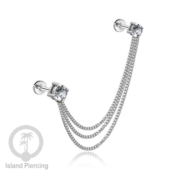 Piercing Set warna silver dengan dua Labret Kristal sambung dengan Rantai.