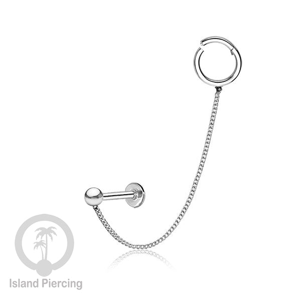 Piercing Set warna silver dengan Labret dan Hinged Segment Ring di sambung dengan Rantai.