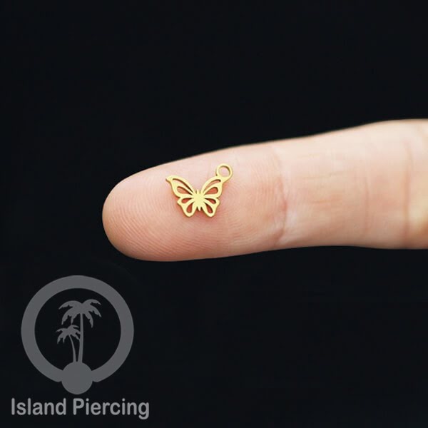 Piercing Charm Liotin Stainless warna gold yang bisa pasang di Tindik dasar semua model tersedia di toko Island Piercing