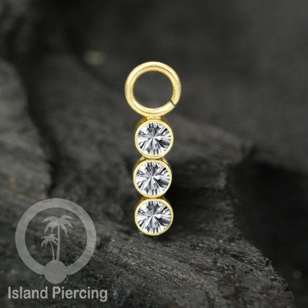 Koleksi Charm yang Liotin Piercing Stainless warna gold sangat lux dengan Kristal Zircon