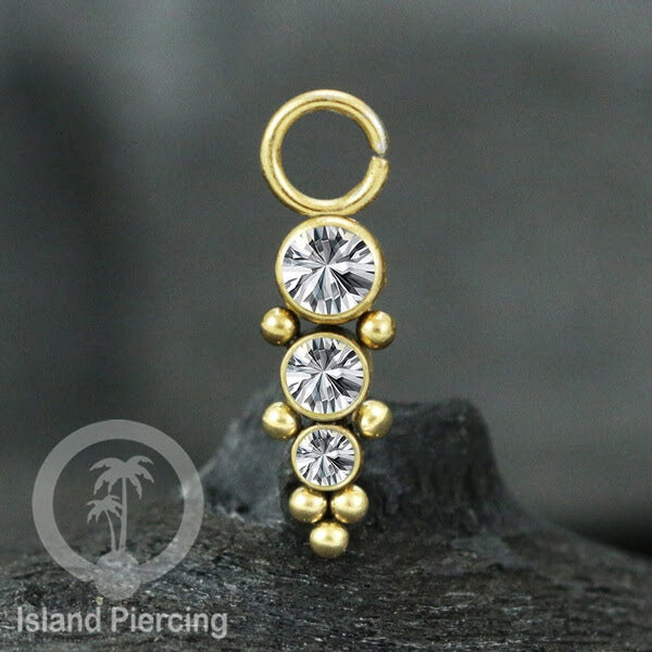 Koleksi Charm yang Liotin Piercing Stainless warna gold sangat lux dengan Kristal Zircon