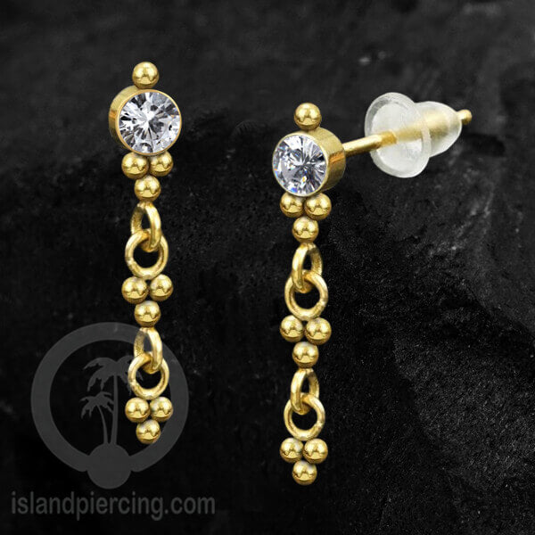 Anting Stud Stainless warna gold yang gantung dengan dekorasi Kristal Zirconia