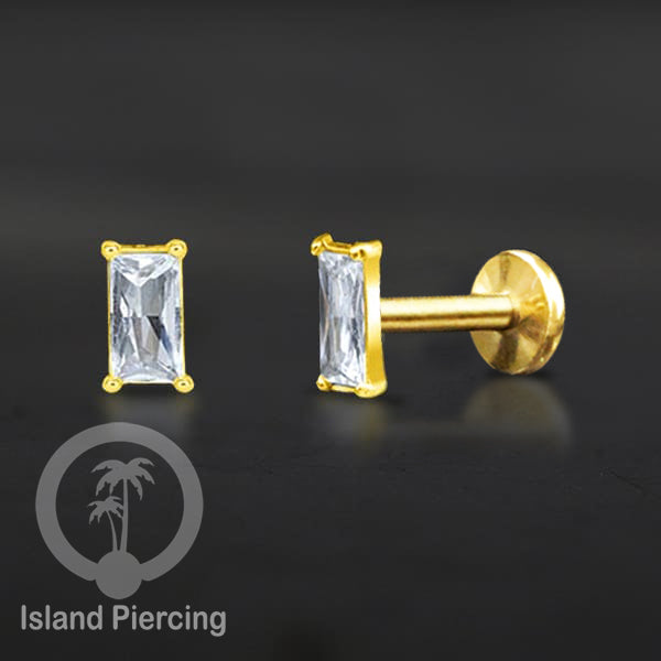 Piercing Labret Stainless Steel warna gold dengan Zirconia banyak bentuk.