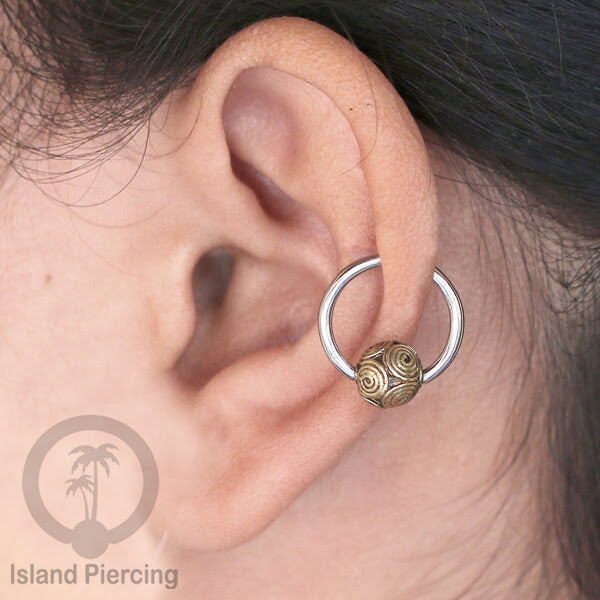 Tindik Stainless Piercing BCR dengan bola Kuningan banyak pilihan yang unik