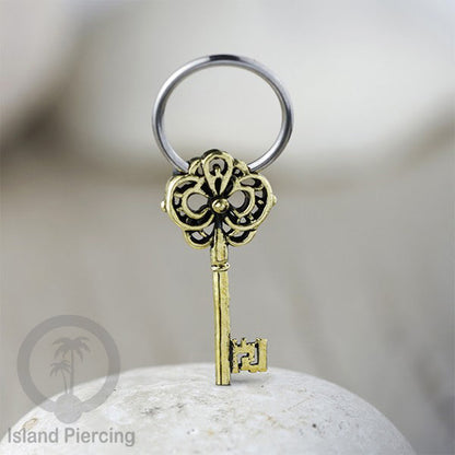 Tindik Stainless Piercing BCR dengan Liontin Kuningan Buddha, Ganesh, Kunci dan Jamur
