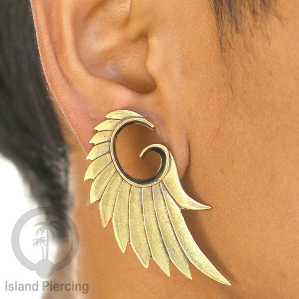 Brass Ear-plug Tindik plug kuningan model besar ke bawah yang sangat unik.