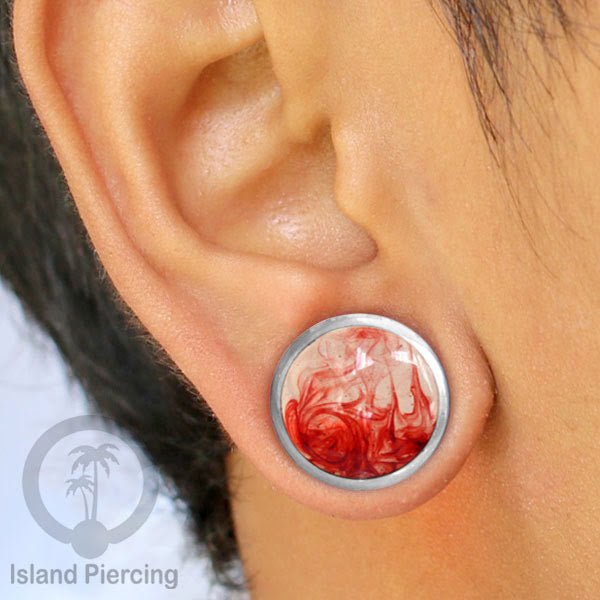 Tindik Ear-plug Resin dalam tunnel kuningan