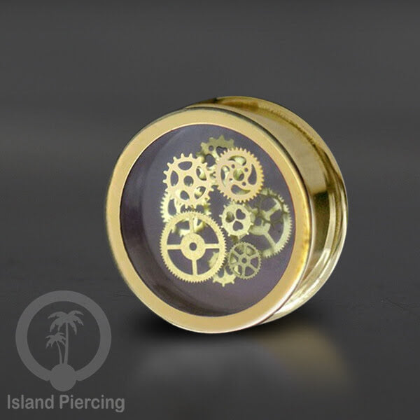 Tindik Ear-plug Resin dalam Flesh Tunnel Kuningan dengan desain Baja di dalam