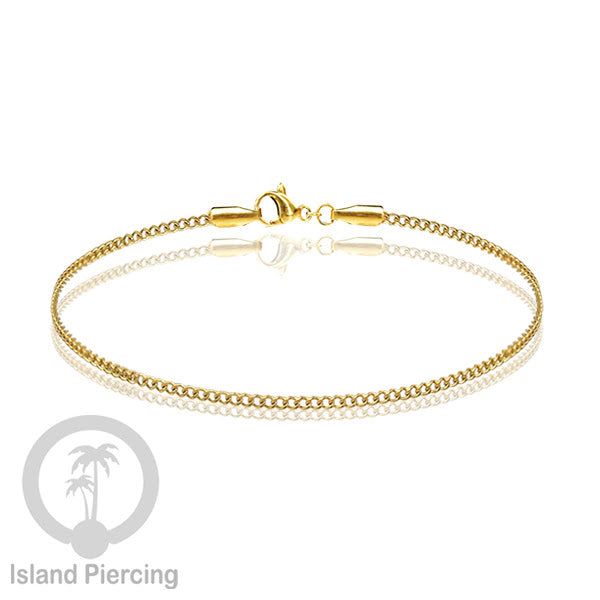 Gelang Tangan dari baja stainless warna emas. Model yang polos cocok untuk kombinasi.