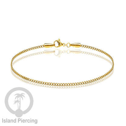Gelang Tangan dari baja stainless warna emas. Model yang polos cocok untuk kombinasi.