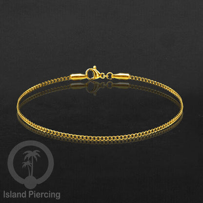 Gelang Tangan dari baja stainless warna emas. Model yang polos cocok untuk kombinasi.