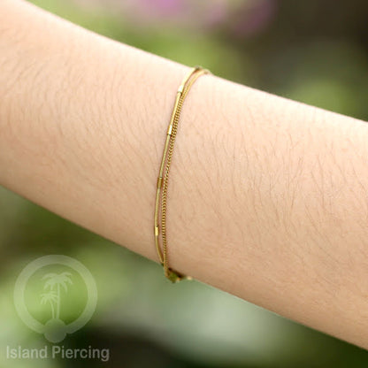 Gelang Tangan dari baja stainless warna emas. Model yang 2-3rantai yang istimewa.