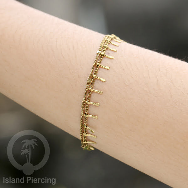 Gelang Tangan dari baja stainless warna emas. Model yang 2-3rantai yang istimewa.