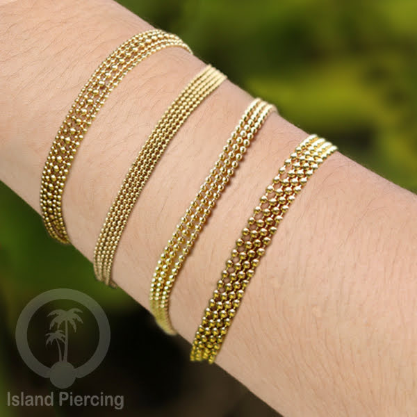 Gelang Tangan dari baja stainless warna emas. Model lebar 3-7 rantai.