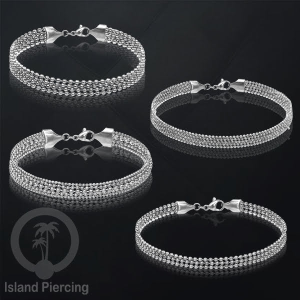 Gelang Tangan dari baja stainless warna silver. Model lebar 3-5 rantai.