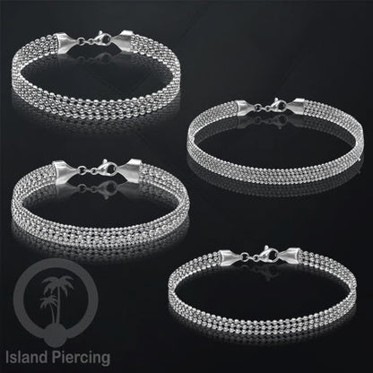 Gelang Tangan dari baja stainless warna silver. Model lebar 3-5 rantai.