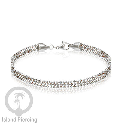Gelang Tangan dari baja stainless warna silver. Model lebar 3-5 rantai.