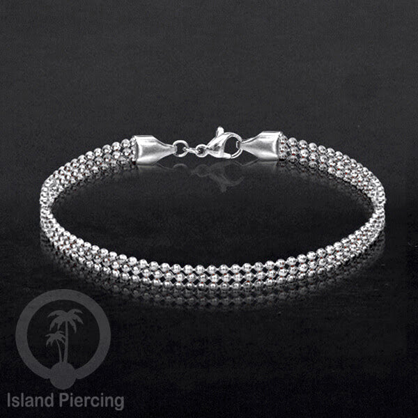 Gelang Tangan dari baja stainless warna silver. Model lebar 3-5 rantai.