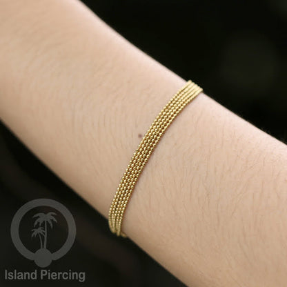 Gelang Tangan dari baja stainless warna emas. Model lebar 3-7 rantai.