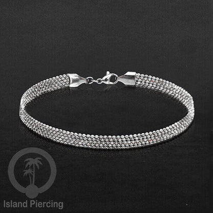 Gelang Tangan dari baja stainless warna silver. Model lebar 3-5 rantai.