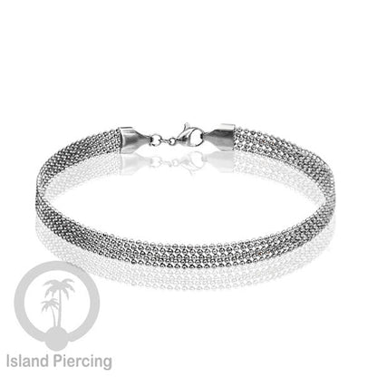 Gelang Tangan dari baja stainless warna silver. Model lebar 3-5 rantai.