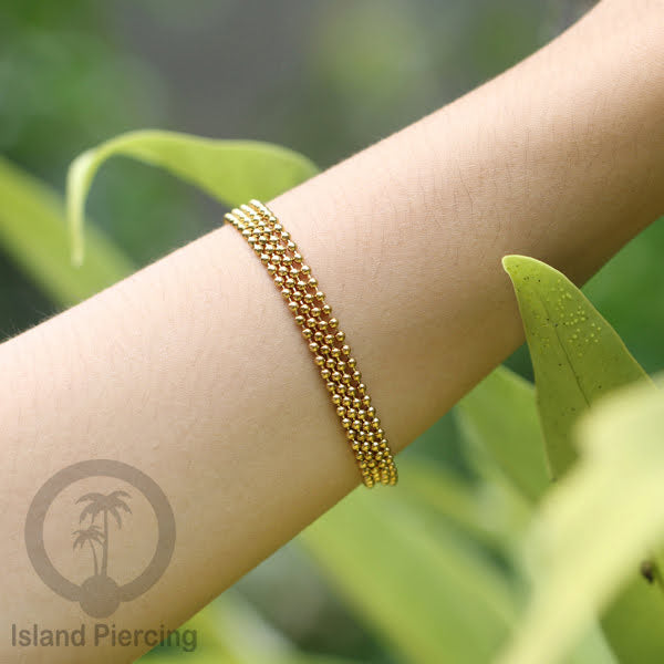 Gelang Tangan dari baja stainless warna emas. Model lebar 3-7 rantai.