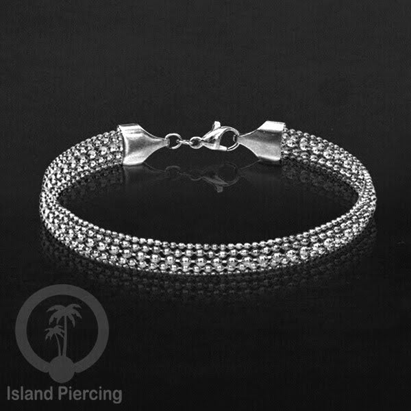 Gelang Tangan dari baja stainless warna silver. Model lebar 3-5 rantai.