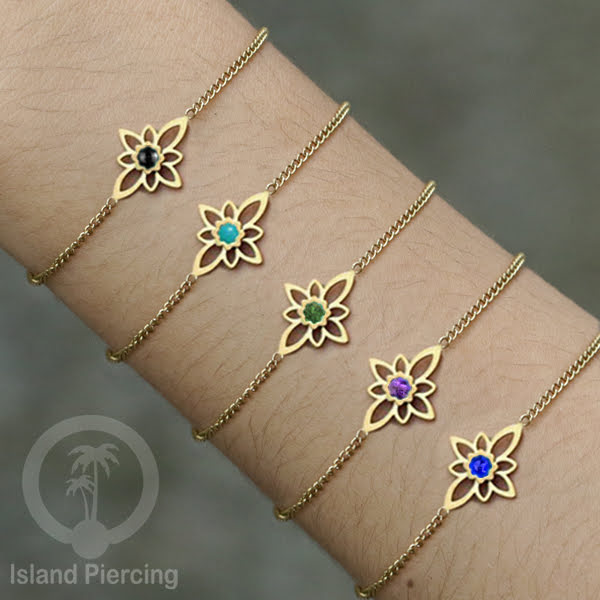 Gelang stainless steel dengan berbagai desain dan hiasan epoksi. Warna gold.