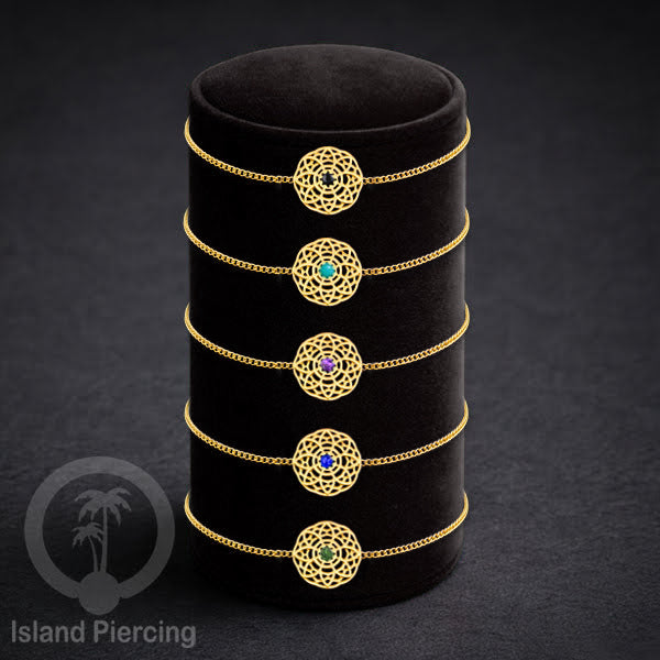 Gelang tribal lotus dari stainless steel dengan berbagai desain dan batu epoksi berwarna. Warna gold.