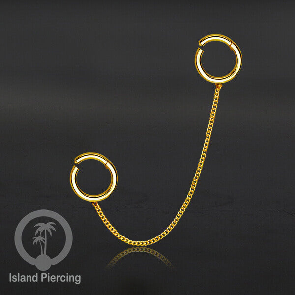 Piercing Set warna gold dengan dua Hinged Segment Ring sambung pakai Rantai.