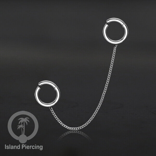 Piercing Set warna silver dengan dua Hinged Segment Ring sambung dengan Rantai.
