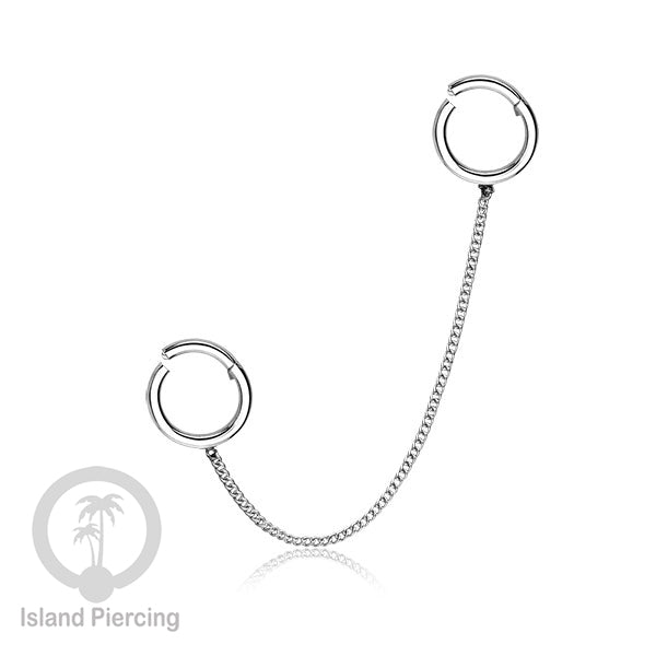 Piercing Set warna silver dengan dua Hinged Segment Ring sambung dengan Rantai.