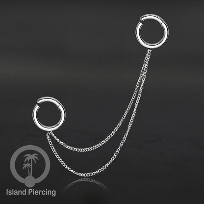 Piercing Set warna silver dengan dua Hinged Segment Ring sambung dengan Rantai.