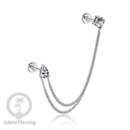 Piercing Set warna silver dengan dua Labret Kristal sambung dengan Rantai.