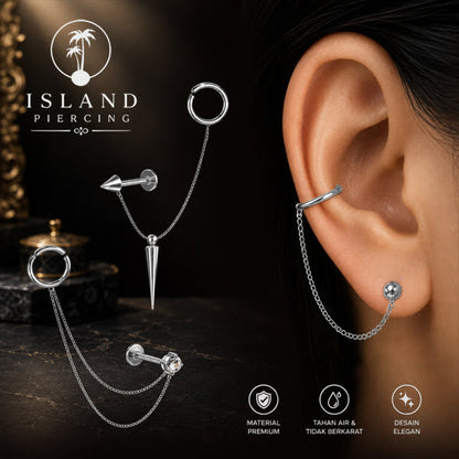 Piercing Set warna silver dengan Labret dan Hinged Segment Ring disambung dengan Rantai.