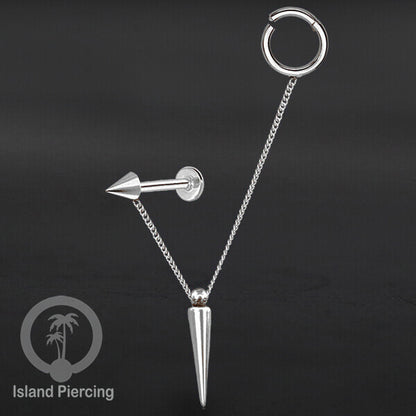 Piercing Set warna silver dengan Labret dan Hinged Segment Ring di sambung dengan Rantai.