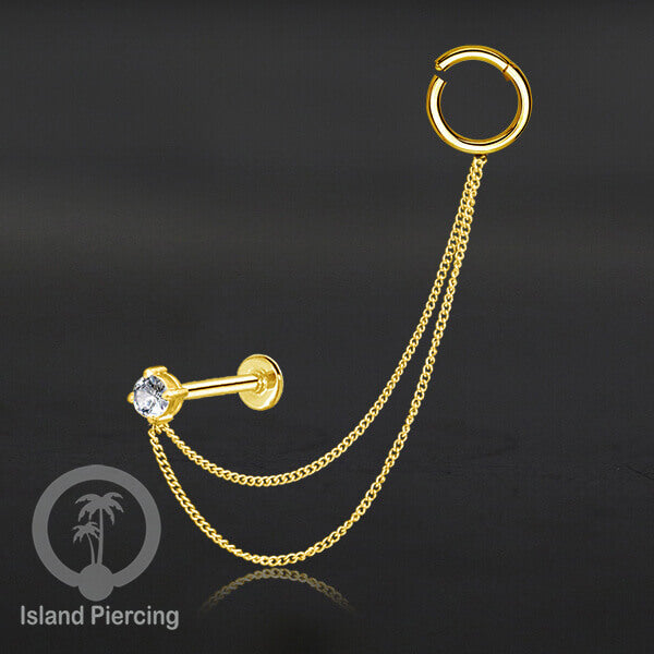 Piercing Set warna gold dengan Labret dan Hinged Segment Ring di sambung dengan Rantai.