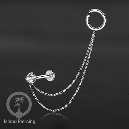 Piercing Set warna silver dengan Labret dan Hinged Segment Ring di sambung dengan Rantai.