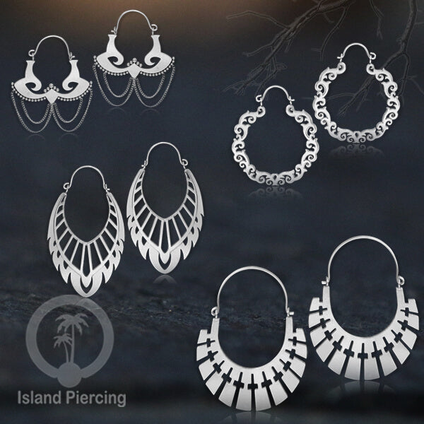Anting stainless steel warna silver motif yang popular.