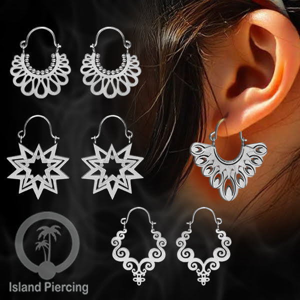 Anting stainless steel warna silver motif yang popular.