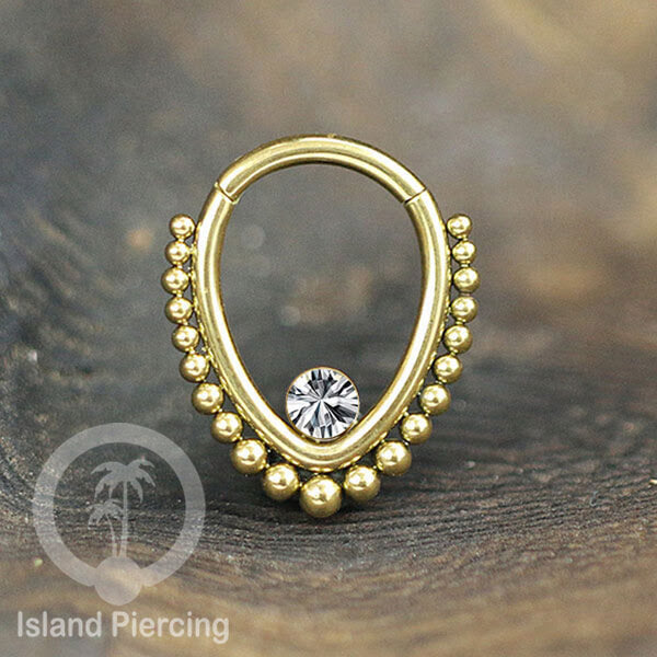 Anting Stainless Piercing warna emas dengan batu