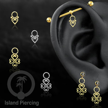 Piercing Charm Liotin Stainless warna silver yang dekorasi pakai tangan dengan potongan hati baja kecil