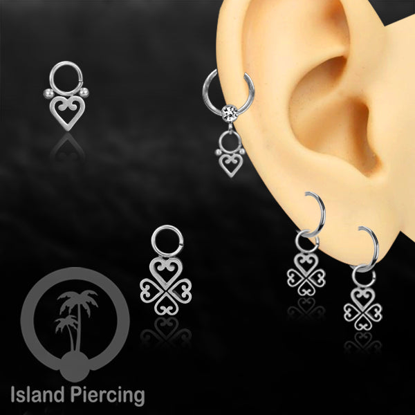 Piercing Charm Liotin Stainless warna silver yang dekorasi pakai tangan dengan potongan hati baja kecil