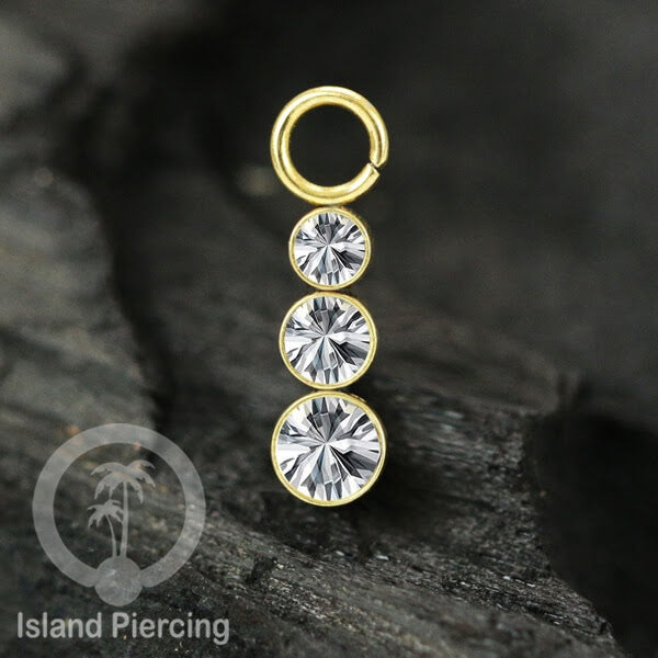Koleksi Charm yang Liotin Piercing Stainless warna gold sangat lux dengan Kristal Zircon