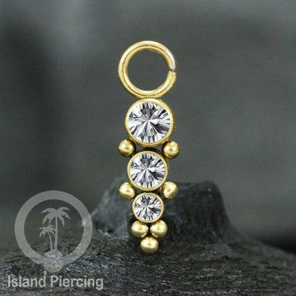 Koleksi Charm yang Liotin Piercing Stainless warna gold sangat lux dengan Kristal Zircon